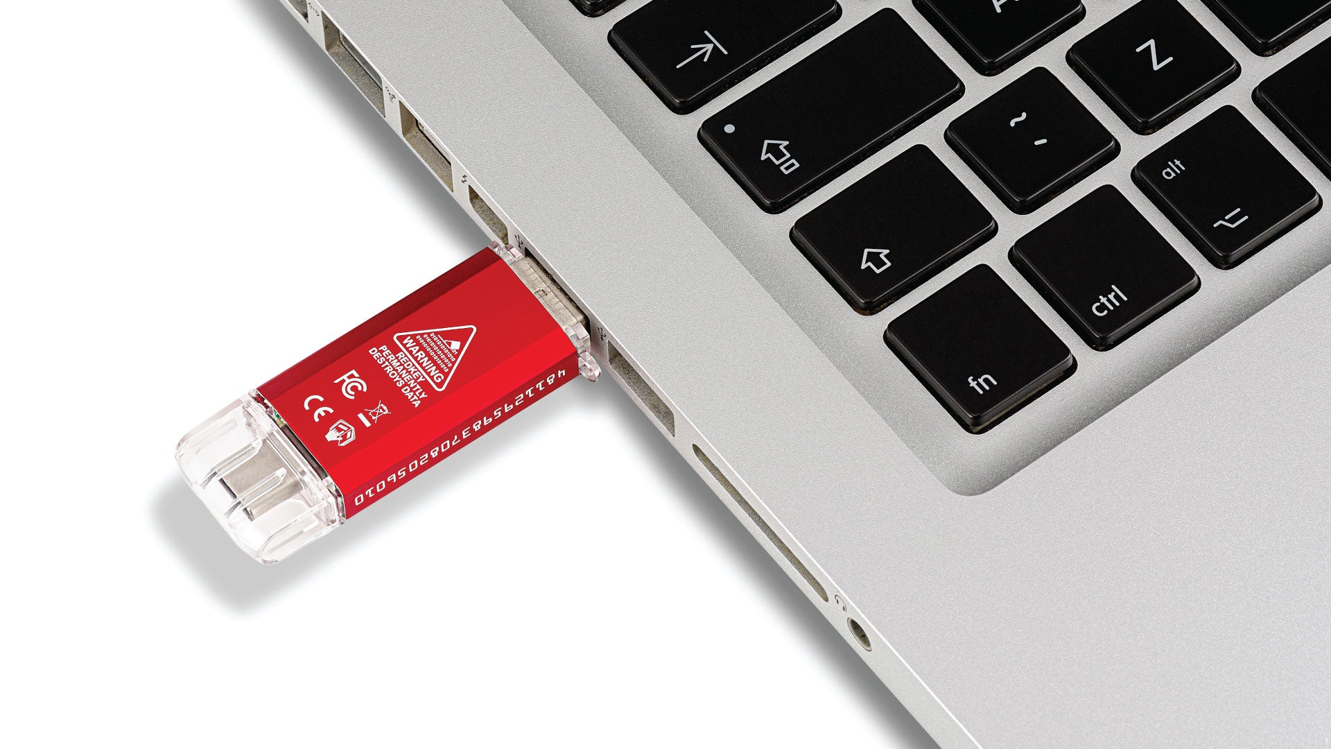 Redkey USB inserted into a laptop USB port